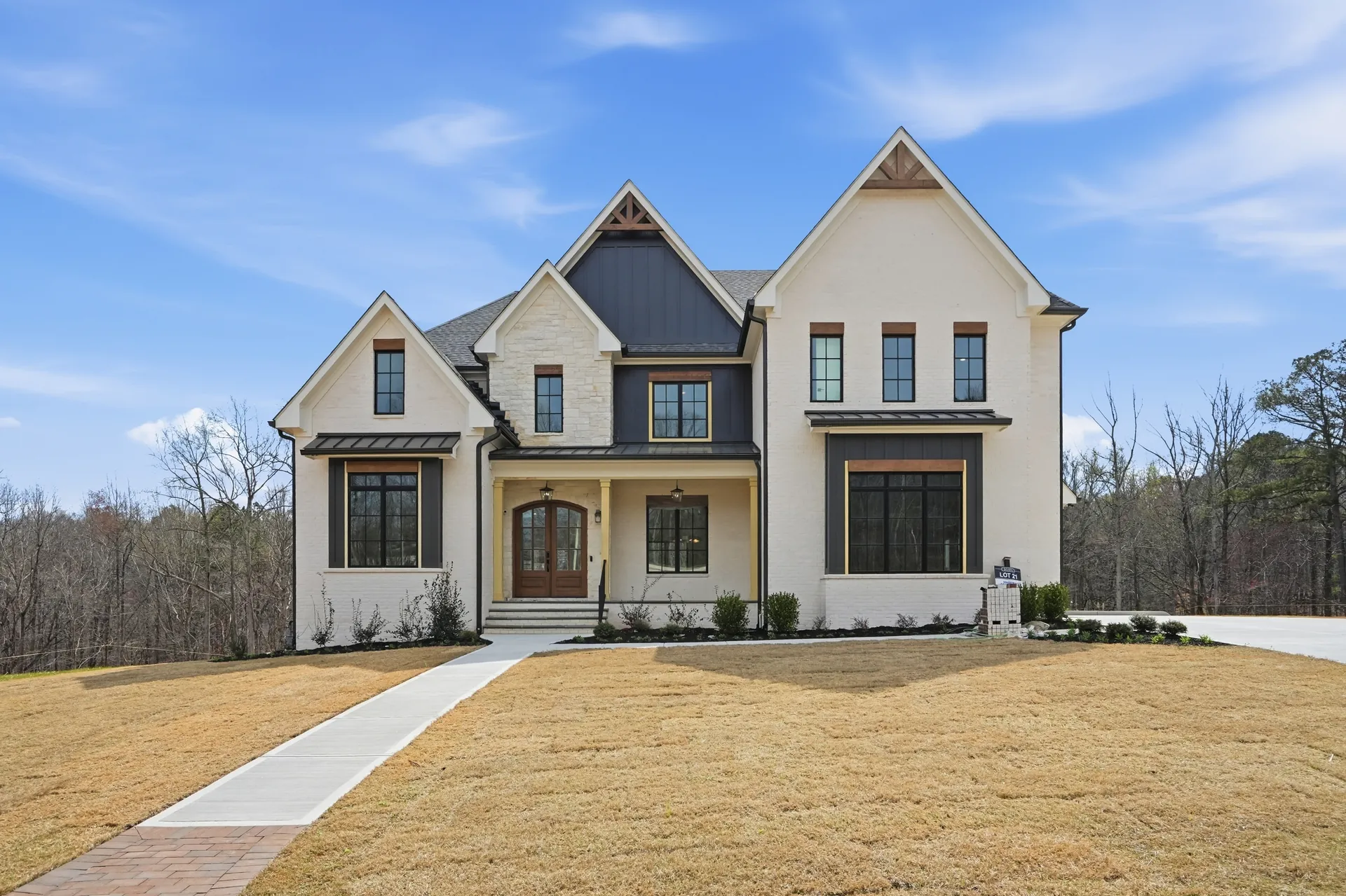 White modern farmhouse at 3550 Alexander Circle in Cumming