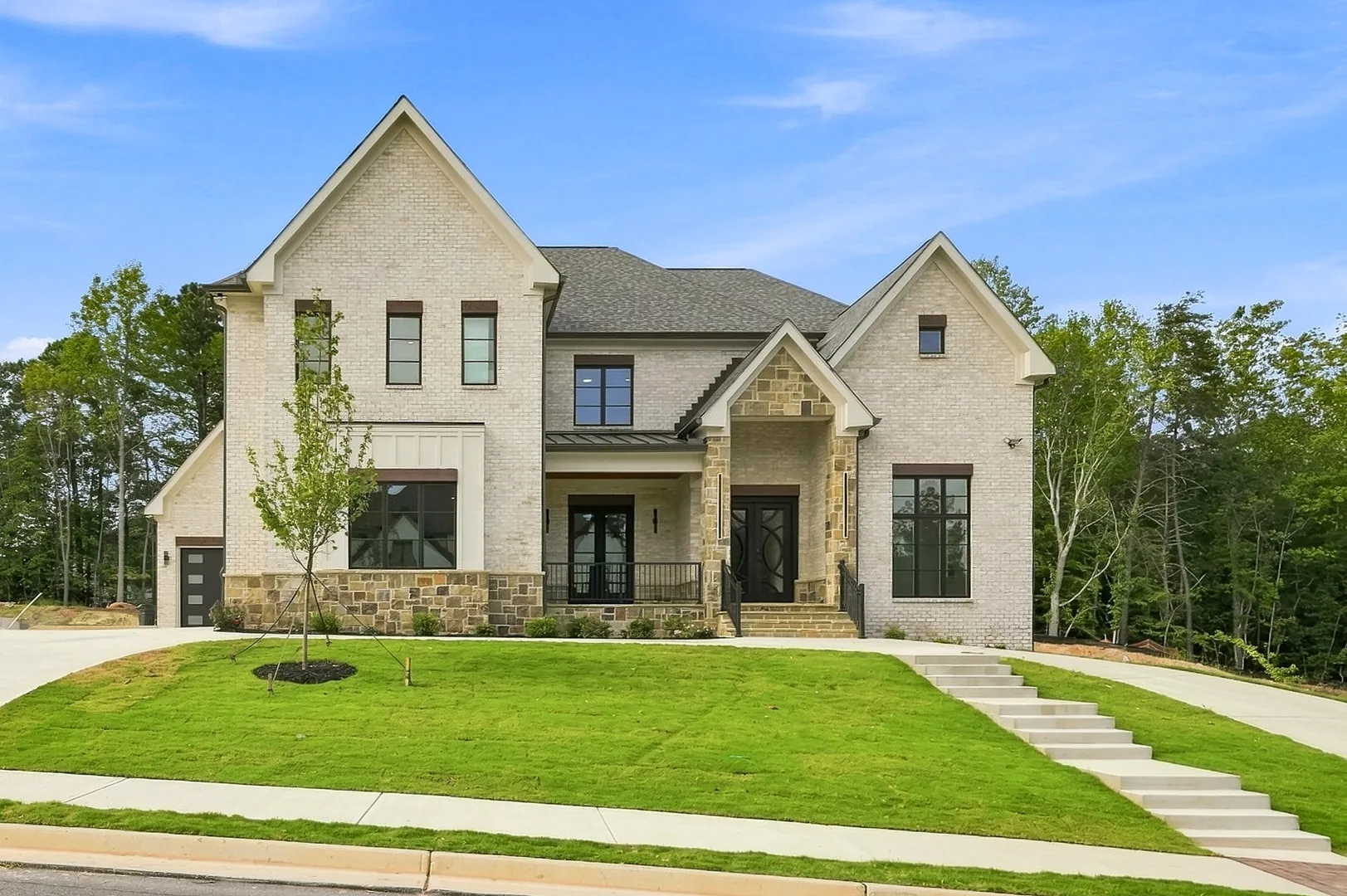 Brick and stone home at 3615 Sky Lane in Suwanee Preserves